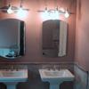 Single vanity removed installed double vanities w / tile 1\2 up walls with chair rail