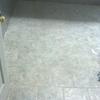 Restaurant floors/ removed peel-n-stick tiles and installed porcelain tiles