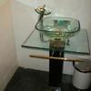 Vanity removed and installed glass pedestal sink