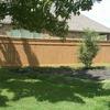 Wood fencing with top rail