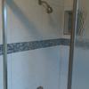 Complete bathroom remodel porcelain tile with shower tile and border